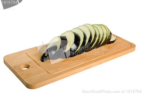 Image of sliced Aubergine in kitchen Board isolated on white