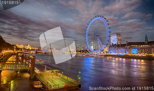 Image of London skyline across the Thames from Westminster Bridge with bl