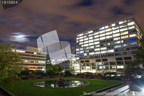 Image of Buildings near Westminster Bridge illuminated at Dusk, London