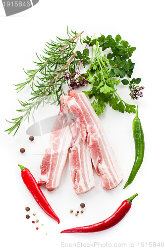 Image of Raw bacon ribs with rosemary