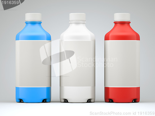 Image of Three colorful  bottles for chemicals or drugs 