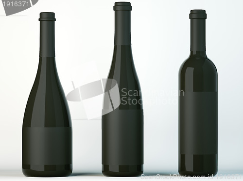 Image of Three corked bottles for wine with black labels 