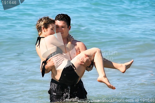 Image of couple in the ocean