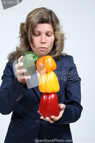 Image of woman with colored peppers, healthy food photo