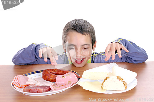 Image of hungry boy for cheese and sausage, food photo