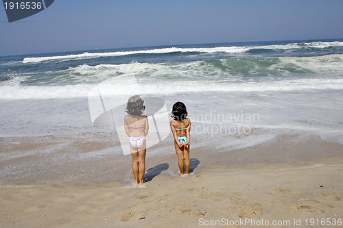 Image of beautiful girl in bikini in the beach, summer photo