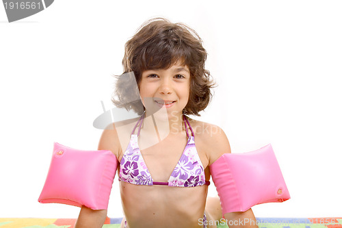 Image of beautiful girl in bikini, child studio photo