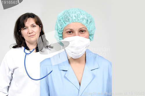 Image of Doctor and nurse  isolated on grey, health photo