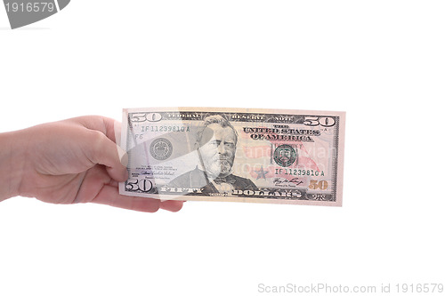 Image of hand holding a dollar bill, business studio photo