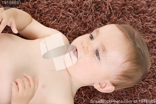 Image of happy baby boy, studio photo session