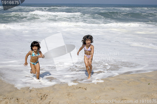 Image of beautiful girl in bikini in the beach, summer photo