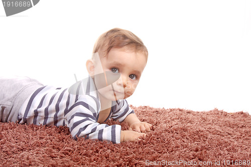 Image of happy baby boy, studio photo session