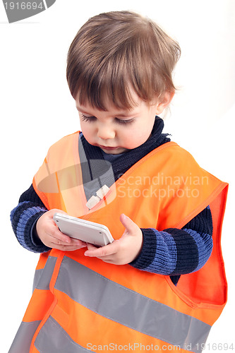 Image of baby businessman working with PDA calculator