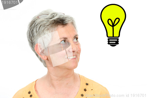 Image of beautiful casual Mature woman having idea