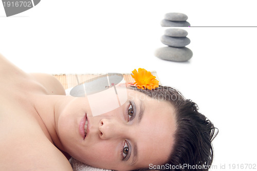 Image of attractive woman in a relaxing treatment spa