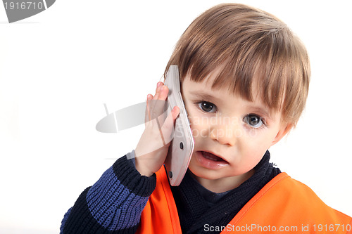 Image of baby boy on the phone