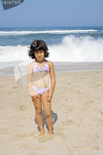 Image of beautiful girl in bikini in the beach, summer photo