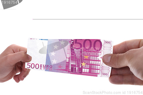 Image of hand holding a euro bill, business studio photo