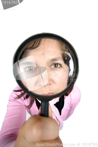 Image of Young businesswoman holding Magnifying Glass, business photo