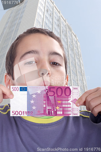 Image of boy with euro bills, business studio photo