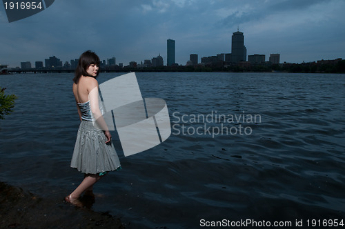 Image of Asian girl at river