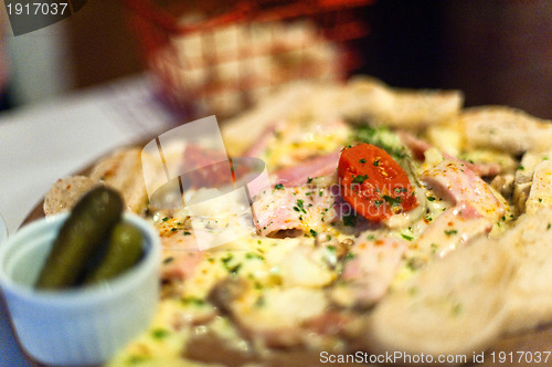 Image of Melted cheese, ham, and bread