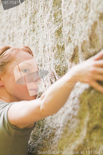 Image of Female rock climber