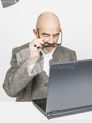 Image of old man computer