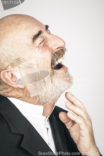 Image of old man laughing