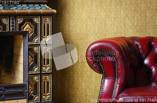 Image of Chair And Fireplace