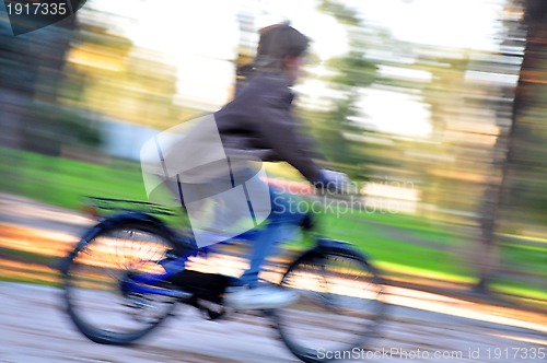 Image of boy riding bike