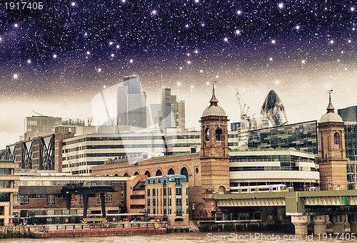 Image of Stars over City of London, financial center and Canary Wharf at 