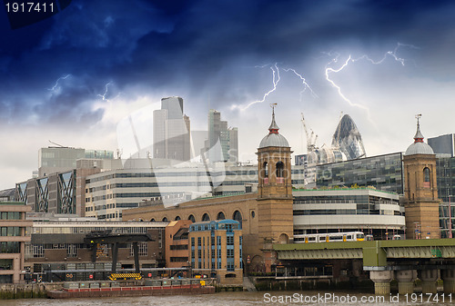 Image of Storm over City of London, financial center and Canary Wharf at 