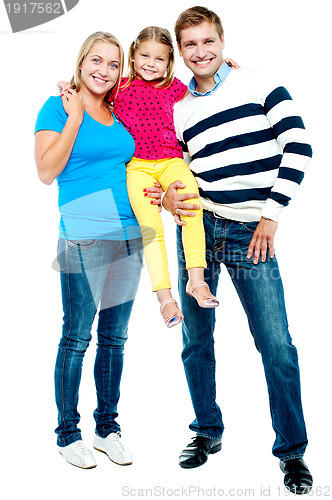 Image of Full length portrait of a cheerful family of three