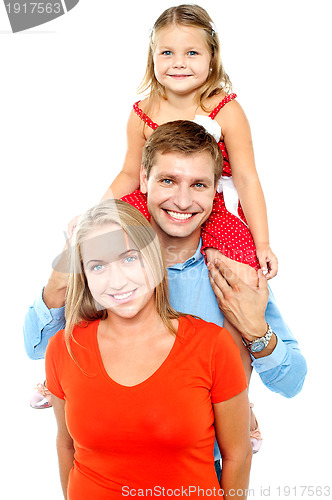 Image of Portrait of cheerful family of three having fun