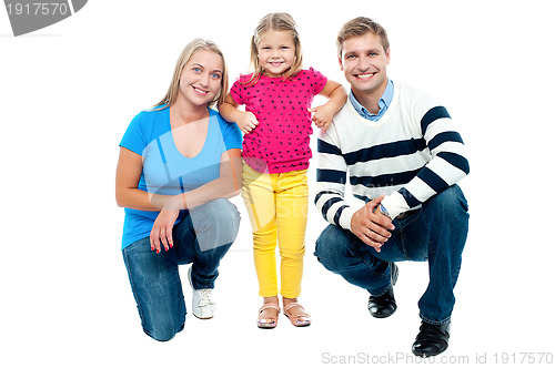 Image of Studio portrait of charming young family