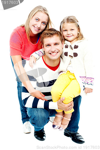 Image of Portrait of happy parents with their daughter