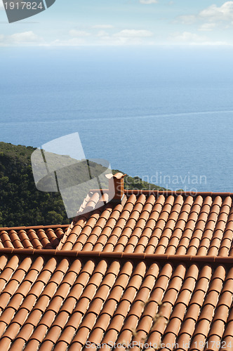 Image of Tile roof of the house overlooking the sea