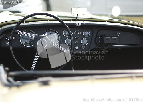 Image of Car steering wheel and dashboard