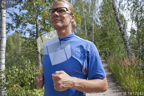 Image of Trail runner in summer