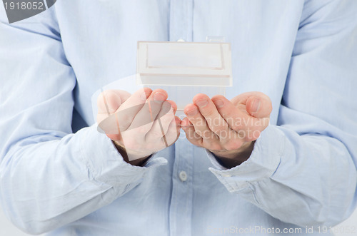 Image of home in hands
