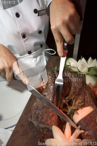 Image of cutting the steak