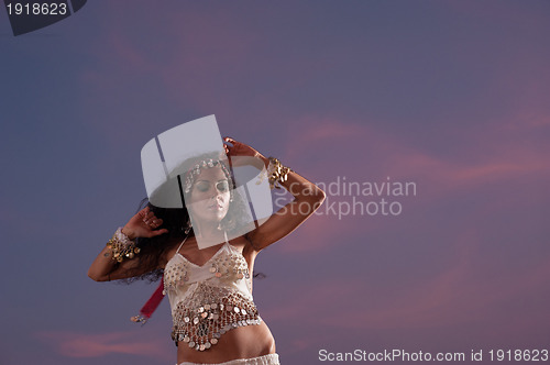 Image of Dancer against evening sky