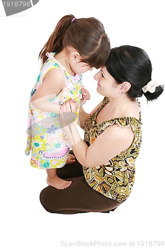 Image of Beautiful latin mother and daughter smiling with love at each ot