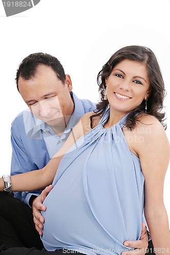 Image of pregnant woman couple together smiling 