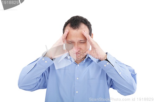 Image of Stressed business man with a headache, isolated over white