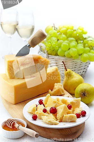Image of Parmesan cheese and fruits