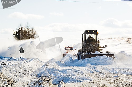 Image of snowplow clearing road