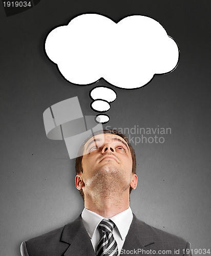 Image of Businessman Looking Upwards With Speech Bubble