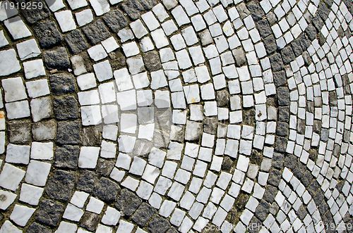 Image of Ancient ceramic tiled decorative stone walkway 